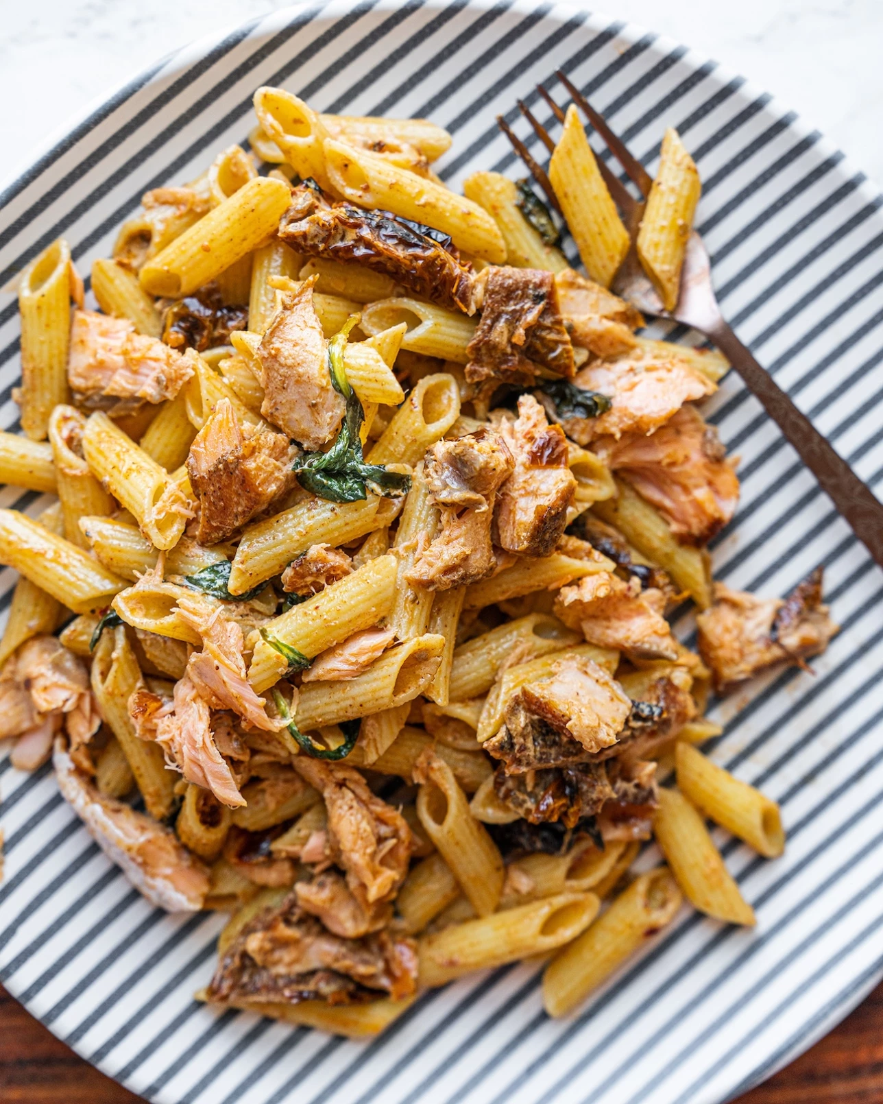 Smoked Salmon Pasta with Sun-Dried Tomato Cream Sauce and Spinach